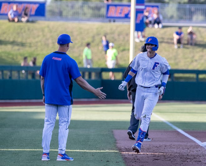 Florida's infielder Deric Fabian (23) with his first homer of the season against Florida A&M. Florida beat FAMU17-7 in 7 innings of play, Tuesday, April 18, 2023, at Condron Family Baseball Park in Gainesville, Florida.[Cyndi Chambers/ Gainesville Sun] 2023