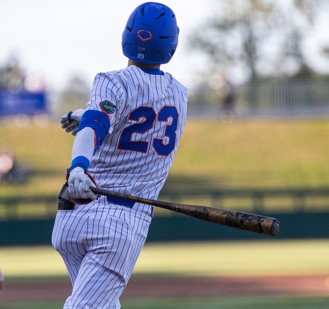 Florida's infielder Deric Fabian (23) with his first homer of the season against Florida A&M. Florida beat FAMU17-7 in 7 innings of play, Tuesday, April 18, 2023, at Condron Family Baseball Park in Gainesville, Florida.[Cyndi Chambers/ Gainesville Sun] 2023