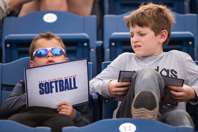 Florida fans watch game during the Florida women’s softball team hosted USF at Katie Seashole Pressly Stadium in Gainesville, FL on Wednesday, April 19, 2023. Florida won 7-3 by hitting a grand slam in the bottom of the seventh inning. [Doug Engle/Gainesville Sun]