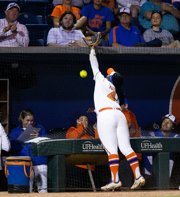 Florida third baseman Charla Echols (4) tries to make a out in the top of the fifth. The Florida women’s softball team hosted USF at Katie Seashole Pressly Stadium in Gainesville, FL on Wednesday, April 19, 2023. Florida won 7-3 by hitting a grand slam in the bottom of the seventh inning. [Doug Engle/Gainesville Sun]