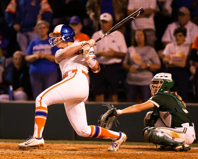 Florida utility Emily Wilkie (18) hits a grand slam in the bottom of the seventh to win the game 7-3. The Florida women’s softball team hosted USF at Katie Seashole Pressly Stadium in Gainesville, FL on Wednesday, April 19, 2023. Florida won 7-3 by hitting a grand slam in the bottom of the seventh inning. [Doug Engle/Gainesville Sun]