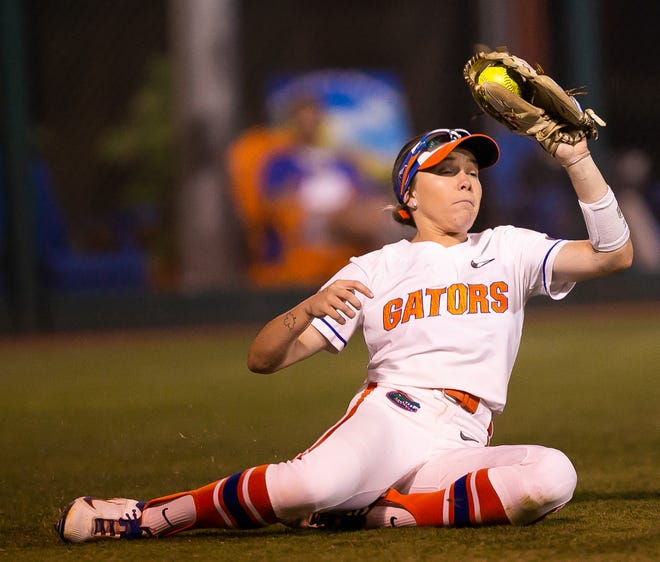 Florida outfielder Kendra Falby (27) catches a fly ball for an out in the top of the seventh. The Florida women’s softball team hosted USF at Katie Seashole Pressly Stadium in Gainesville, FL on Wednesday, April 19, 2023. Florida won 7-3 by hitting a grand slam in the bottom of the seventh inning. [Doug Engle/Gainesville Sun]