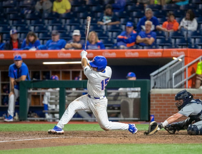 Florida's catcher BT Riopelle (15) with a RBI single in the bottom of the eighth against UNF, Tuesday, April 25, 2023, at Condron Family Baseball Park in Gainesville, Florida. UF won 6-2. [Cyndi Chambers/ Gainesville Sun] 2023