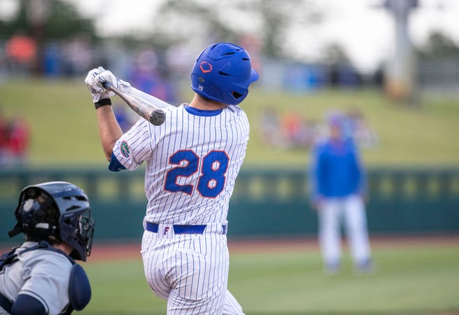 Florida's catcher Luke Heyman (28) with a homer against UNF, Tuesday, April 25, 2023, at Condron Family Baseball Park in Gainesville, Florida. UF won 6-2. [Cyndi Chambers/ Gainesville Sun] 2023