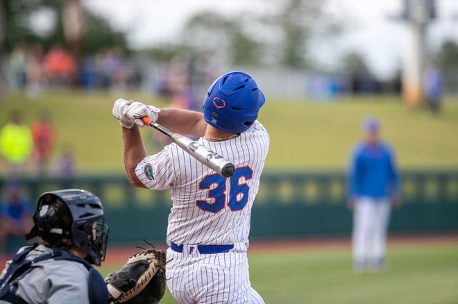 Florida left fielder Wyatt Langford (36) belts a double against UNF, Tuesday, April 25, 2023, at Condron Family Baseball Park in Gainesville, Florida. UF won 6-2. [Cyndi Chambers/ Gainesville Sun] 2023
