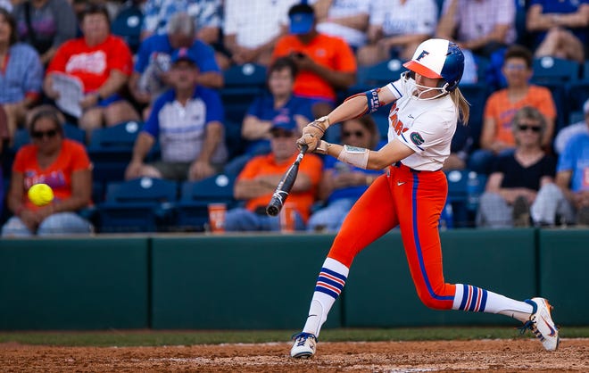 Florida Gators outfielder Kendra Falby (27) base hit in the bottom of the third. The Florida women’s softball team hosted FSU at Katie Seashole Pressly Stadium in Gainesville, FL on Wednesday, May 3, 2023. The Seminoles defeated the Gators 8-7.  [Doug Engle/Gainesville Sun]