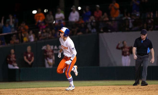 Florida Gators infielder Skylar Wallace (17) screams while running the bases after hitting her second home run of the night. The Florida women’s softball team hosted FSU at Katie Seashole Pressly Stadium in Gainesville, FL on Wednesday, May 3, 2023. The Seminoles defeated the Gators 8-7.  [Doug Engle/Gainesville Sun]