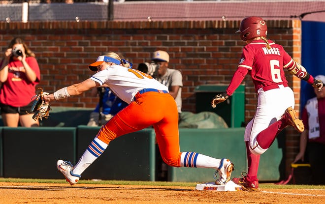 Florida Gators utility Emily Wilkie (18) outs Florida St. Seminoles outfielder Kaley Mudge (6) in the top of the first. The Florida women’s softball team hosted FSU at Katie Seashole Pressly Stadium in Gainesville, FL on Wednesday, May 3, 2023. The Seminoles defeated the Gators 8-7.  [Doug Engle/Gainesville Sun]
