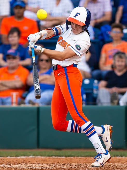 Florida Gators first baseman Avery Goelz (2) slap hits the ball in the bottom of the third. The Florida women’s softball team hosted FSU at Katie Seashole Pressly Stadium in Gainesville, FL on Wednesday, May 3, 2023. The Seminoles defeated the Gators 8-7.  [Doug Engle/Gainesville Sun]