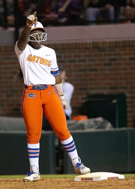 Florida Gators Sam Roe (13) celebrates on first base after hitting a single in the bottom of the seventh. The Florida women’s softball team hosted FSU at Katie Seashole Pressly Stadium in Gainesville, FL on Wednesday, May 3, 2023. The Seminoles defeated the Gators 8-7.  [Doug Engle/Gainesville Sun]