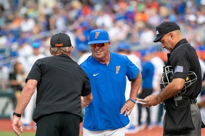 Florida's head coach Kevin O'Sullivan shakes hands with Florida A&M head coach Jamey Shouppe before the start of their NCAA Regionals game, Friday, June 2, 2023, at Condron Family Ballpark in Gainesville, Florida. The Gators shut out the Rattlers 3-0, and face Texas Tech Saturday. [Cyndi Chambers/ Gainesville Sun] 2023