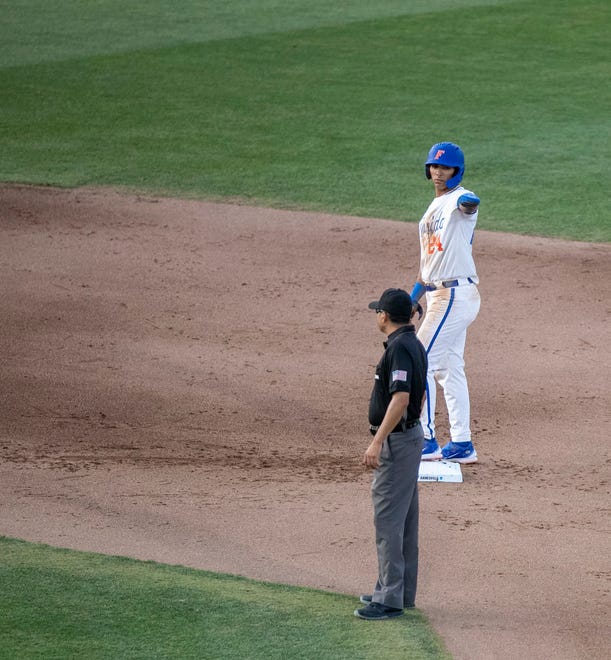 Florida's infielder Josh Rivera (24) points to Luke Heyman on first base after HeymanÕs (28) RBI single in the bottom of the eighth inning against Florida A&M in NCAA Regionals, Friday, June 2, 2023, at Condron Family Ballpark in Gainesville, Florida. The Gators shut out the Rattlers 3-0, and face Texas Tech Saturday. [Cyndi Chambers/ Gainesville Sun] 2023