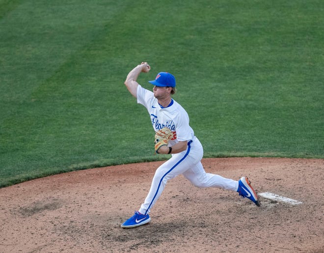 Florida's pitcher Brandon Neely (22) pitches in relief  against Florida A&M in NCAA Regionals, Friday, June 2, 2023, at Condron Family Ballpark in Gainesville, Florida. The Gators shut out the Rattlers 3-0, and face Texas Tech Saturday. [Cyndi Chambers/ Gainesville Sun] 2023