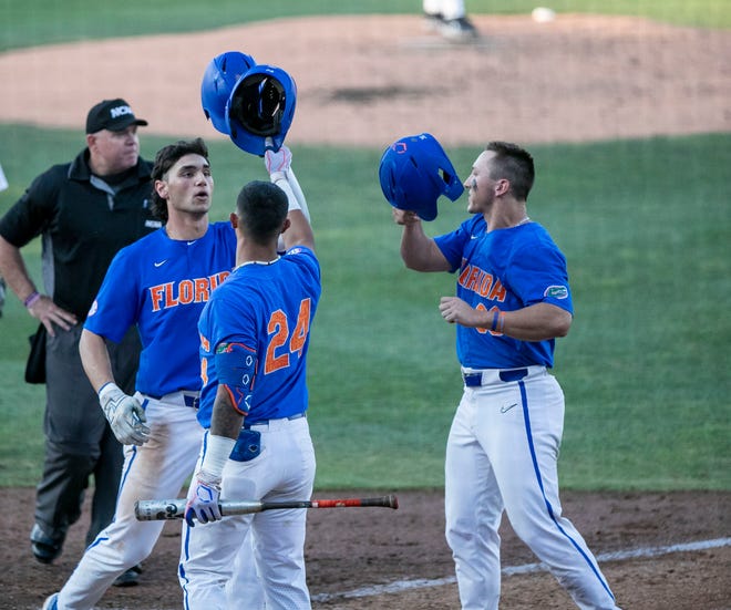 Florida utility Jac CaglianoneÕs (14) with a home run on Texas Tech in Round 2 of NCAA Regionals, Saturday, June 3, 2023, at Condron Family Ballpark in Gainesville, Florida. The Gators fell to the Red Raiders 5-4. They will face U Conn Sunday. [Cyndi Chambers/ Gainesville Sun] 2023