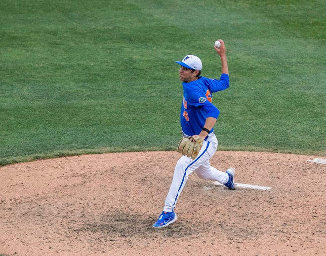 Gators Nick Ficarrotta (46) closes out the game pitching against U Conn in the top of the ninth in NCAA Regionals, Sunday, June 4, 2023, at Condron Family Ballpark in Gainesville, Florida. Florida beat U Conn 8-2. [Cyndi Chambers/ Gainesville Sun] 2023