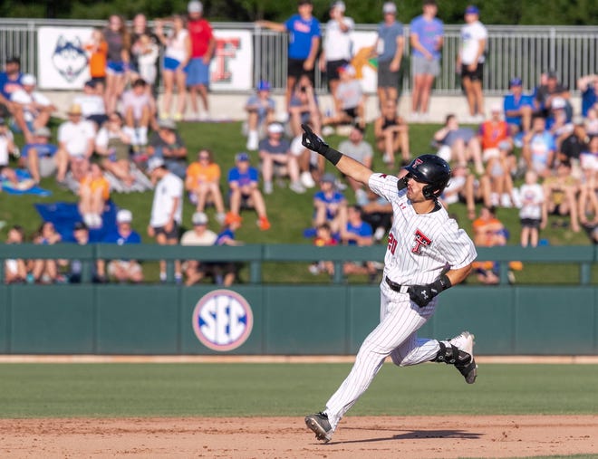 Texas Tech infielder Austin Green (20) with a home run against Florida in Round 2 of NCAA Regionals, Saturday, June 3, 2023, at Condron Family Ballpark in Gainesville, Florida. The Gators fell to the Red Raiders 5-4. They will face U Conn Sunday. [Cyndi Chambers/ Gainesville Sun] 2023