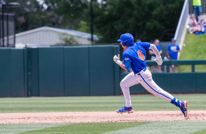 Gators infielder Tyler Shelnut (6) with a double in the bottom of the fifth against U Conn in NCAA Regionals, Sunday, June 4, 2023, at Condron Family Ballpark in Gainesville, Florida. Florida beat U Conn 8-2. [Cyndi Chambers/ Gainesville Sun] 2023