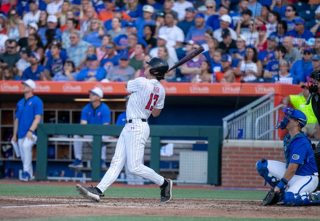 Texas Tech infielder Gavin Kash (13) with a home run against Florida in Round 2 of NCAA Regionals, Saturday, June 3, 2023, at Condron Family Ballpark in Gainesville, Florida. The Gators fell to the Red Raiders 5-4. They will face U Conn Sunday. [Cyndi Chambers/ Gainesville Sun] 2023