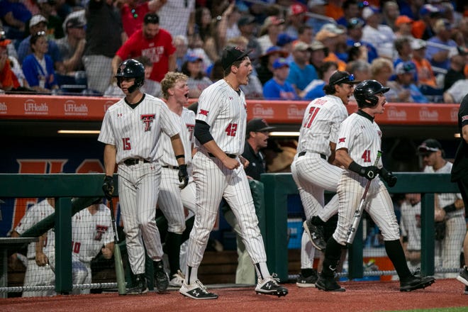 Texas Tech dugout reacts to infielder Gavin KashÕs (13) home run  in Round 2 of NCAA Regionals, Saturday, June 3, 2023, at Condron Family Ballpark in Gainesville, Florida. The Gators fell to the Red Raiders 5-4. They will face U Conn Sunday. [Cyndi Chambers/ Gainesville Sun] 2023