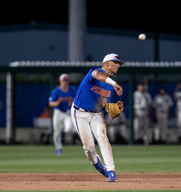 Florida infielder Josh Rivera (24) with the throw to first on Texas Tech in Round 2 of NCAA Regionals, Saturday, June 3, 2023, at Condron Family Ballpark in Gainesville, Florida. The Gators fell to the Red Raiders 5-4. They will face U Conn Sunday. [Cyndi Chambers/ Gainesville Sun] 2023
