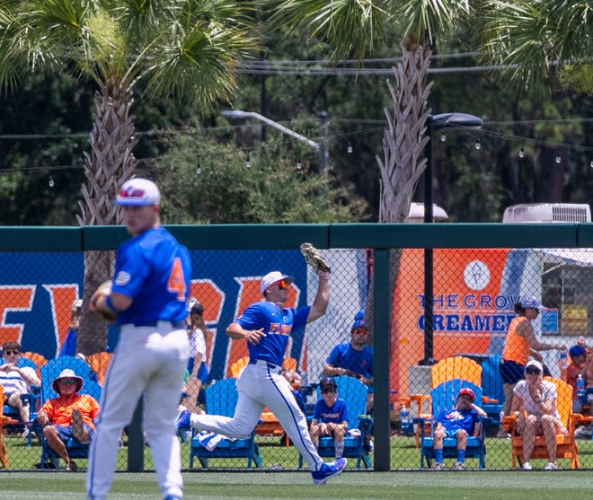 Gators utility Wyatt Langford (36) catches the pop-up from Huskies Jacob Studley (11) in the top of the fourth inning in NCAA Regionals, Sunday, June 4, 2023, at Condron Family Ballpark in Gainesville, Florida. Florida beat U Conn 8-2. [Cyndi Chambers/ Gainesville Sun] 2023