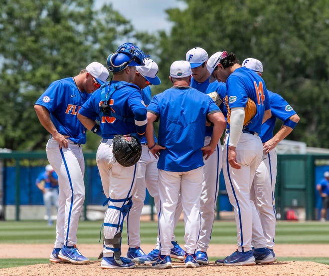 Florida head coach Kevin OÕ Sullivan with a mound visit in the top of the eighth against U Conn in NCAA Regionals, Sunday, June 4, 2023, at Condron Family Ballpark in Gainesville, Florida. Florida beat U Conn 8-2. [Cyndi Chambers/ Gainesville Sun] 2023