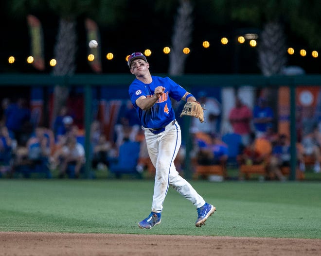 Florida infielder Cade Kurland (4) with the throw to first against Texas Tech in Round 2 of NCAA Regionals, Saturday, June 3, 2023, at Condron Family Ballpark in Gainesville, Florida. The Gators fell to the Red Raiders 5-4. They will face U Conn Sunday. [Cyndi Chambers/ Gainesville Sun] 2023