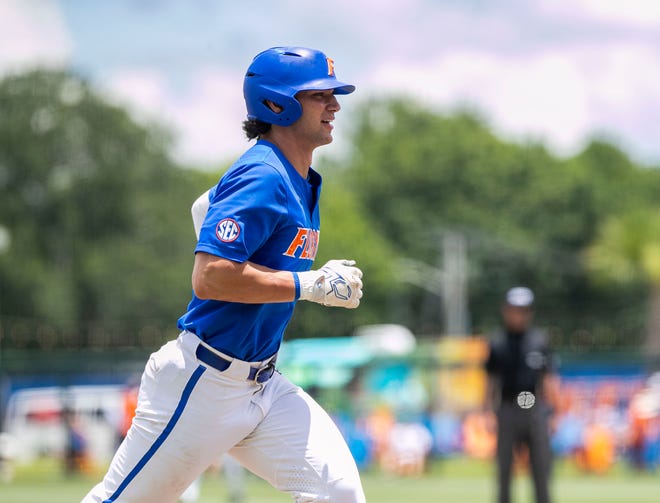 Gators Jac Caglianone (14) with a three run homer in the bottom of the fourth inning against U Conn in NCAA Regionals, Sunday, June 4, 2023, at Condron Family Ballpark in Gainesville, Florida. Florida beat U Conn 8-2. [Cyndi Chambers/ Gainesville Sun] 2023