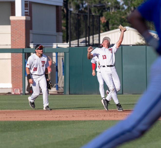 Texas Tech infielder Gavin Kash (13) with the catch for the out on Florida in Round 2 of NCAA Regionals, Saturday, June 3, 2023, at Condron Family Ballpark in Gainesville, Florida. The Gators fell to the Red Raiders 5-4. They will face U Conn Sunday. [Cyndi Chambers/ Gainesville Sun] 2023