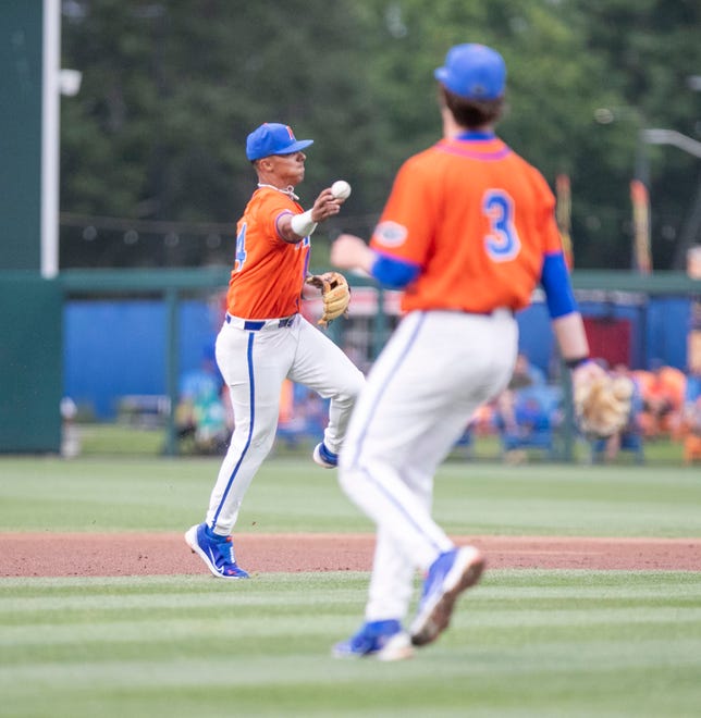 Gators infielder Josh Rivera (24) with the throw to first for the out on Texas tech in NCAA Regionals, Sunday, June 4, 2023, at Condron Family Ballpark in Gainesville, Florida.  Florida beat Texas Tech 7-1 and advance to the Regional final game. [Cyndi Chambers/ Gainesville Sun] 2023
