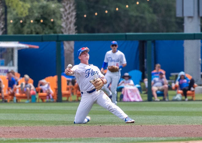 Gators infielder Cade Kurland (4) with the throw to first for the out against the Red Raiders in a win-all elimination game of the NCAA Regionals, Monday, June 5, 2023, at Condron Family Ballpark in Gainesville, Florida. Florida beat Texas Tech 6-0 and advances to Super Regionals. [Cyndi Chambers/ Gainesville Sun] 2023