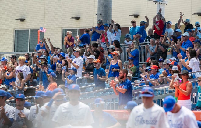 Fans celebrate Gators utility Wyatt Langford (36) home run during the bottom of the third inning during the NCAA Regionals final, Monday, June 5, 2023, at Condron Family Ballpark in Gainesville, Florida. Florida beat Texas Tech 6-0 and advances to Super Regionals. [Cyndi Chambers/ Gainesville Sun] 2023