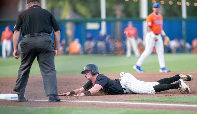 Red Raiders infielder Hudson White (5) steals third on the Gators in NCAA Regionals, Sunday, June 4, 2023, at Condron Family Ballpark in Gainesville, Florida.  Florida beat Texas Tech 7-1 and advance to the Regional final game. [Cyndi Chambers/ Gainesville Sun] 2023