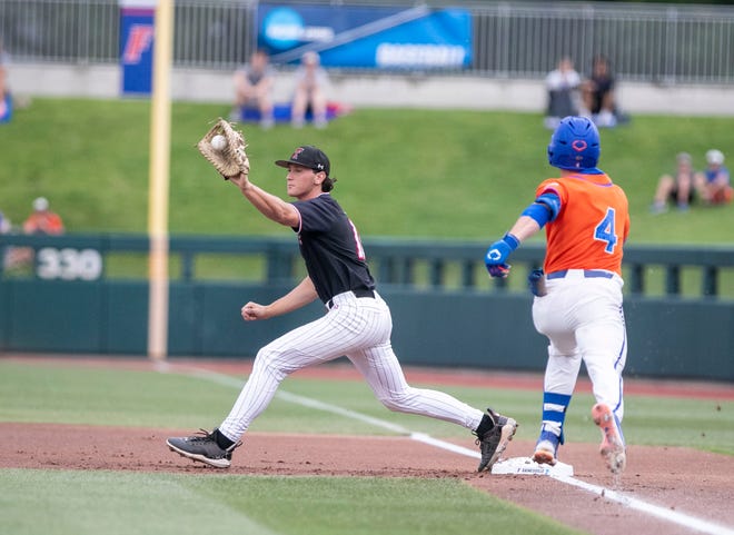 Red Raiders infielder Gavin Kash (13) with the catch at first to get Gators infielder Cade Kurland (4) out in NCAA Regionals, Sunday, June 4, 2023, at Condron Family Ballpark in Gainesville, Florida.  Florida beat Texas Tech 7-1 and advance to the Regional final game. [Cyndi Chambers/ Gainesville Sun] 2023