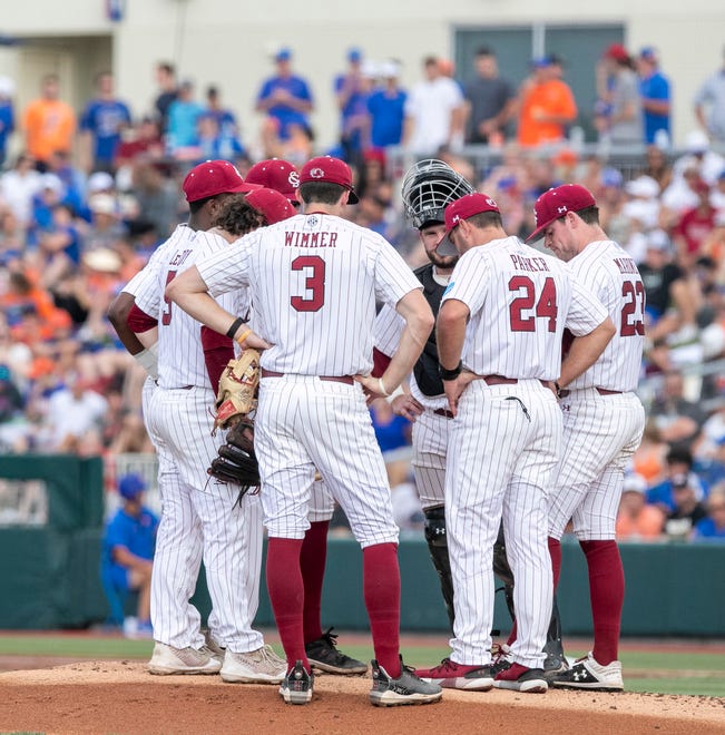 The Gamecocks have a meeting one the mound in Game 2 of the NCAA Super Regional against Florida, Saturday, June 10, 2023, at Condron Family Ballpark in Gainesville, Florida. The Gators beat the Gamecocks 4-0 and are headed to the College World Series in Omaha.  [Cyndi Chambers/ Gainesville Sun] 2023