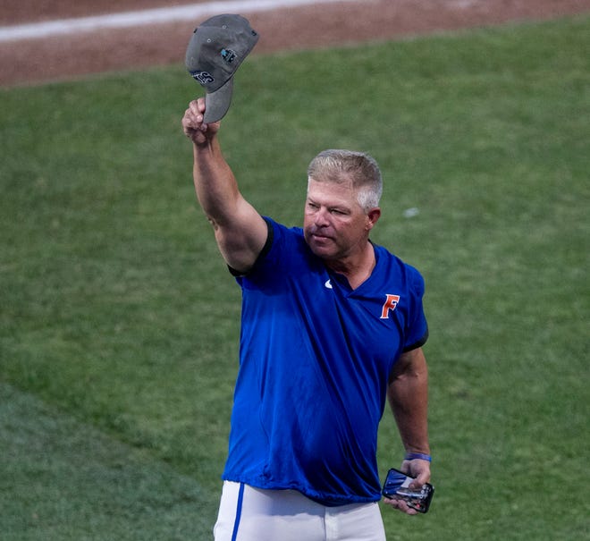 Gators head coach Kevin OÕ Sullivan acknowledges the crowd after FloridaÕs win over South Carolina in Game 2 of the NCAA Super Regional, Saturday June 10, 2023, at Condron Family Ballpark in Gainesville, Florida. The Gators beat the Gamecocks 4-0 and are headed to the College World Series in Omaha.  [Cyndi Chambers/ Gainesville Sun] 2023