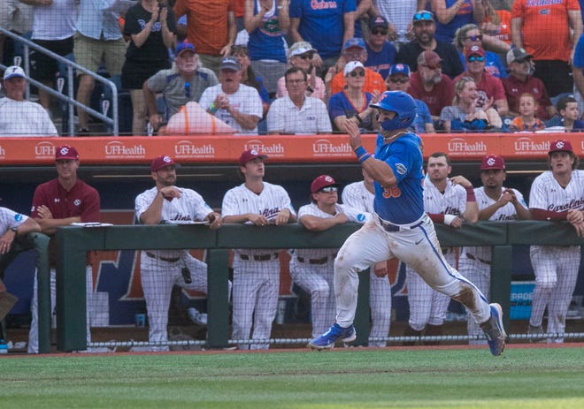 Gators utility Wyatt Langford (36) heads for home against South Carolina in Game 2 of the NCAA Super Regionals, Saturday, June 10, 2023, at Condron Family Ballpark in Gainesville, Florida. The Gators beat the Gamecocks 4-0 and are headed to the College World Series in Omaha.  [Cyndi Chambers/ Gainesville Sun] 2023
