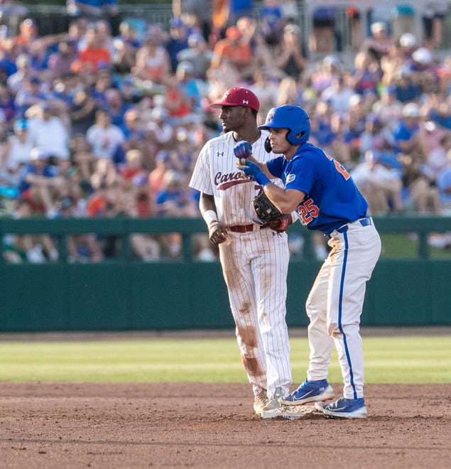 Gators outfielder Richie Schiekofer (25) steals second against South Carolina in Game 2 of the NCAA Super Regionals, Saturday, June 10, 2023, at Condron Family Ballpark in Gainesville, Florida. The Gators beat the Gamecocks 4-0 and are headed to the College World Series in Omaha.  [Cyndi Chambers/ Gainesville Sun] 2023