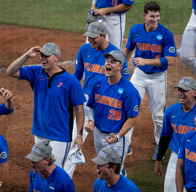 The Gators celebrate their win over South Carolina in Game 2 of the NCAA Super Regional, Saturday, June 10, 2023, at Condron Family Ballpark in Gainesville, Florida. The Gators beat the Gamecocks 4-0 and are headed to the College World Series in Omaha.  [Cyndi Chambers/ Gainesville Sun] 2023